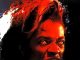 Russell Clark as Belle in Fright Night Part 2