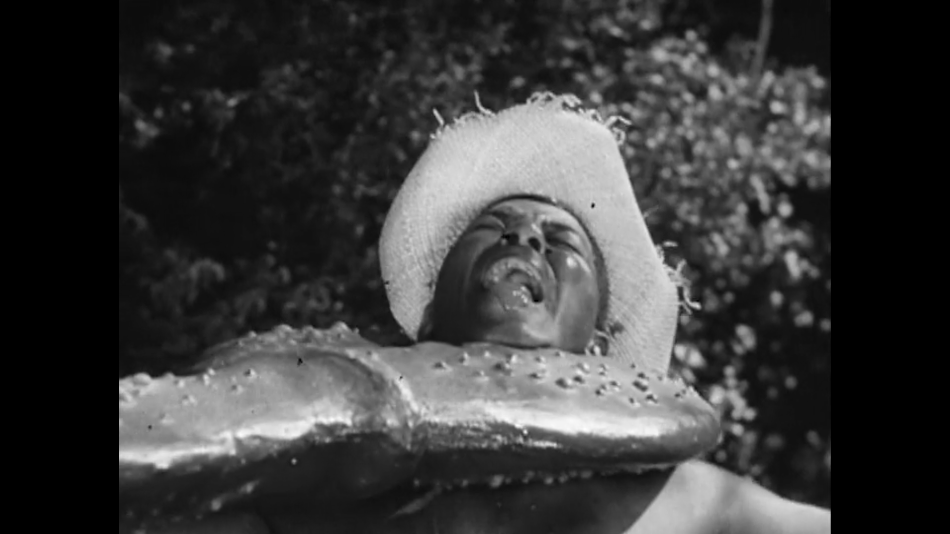 A scene from the movie Monster from Green Hell